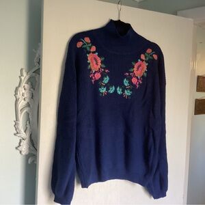 2 sweaters with floral details